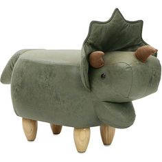 an elephant shaped chair with wooden legs and feet on it's head, sitting in front of a white background