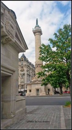 an old building with a clock tower in the background