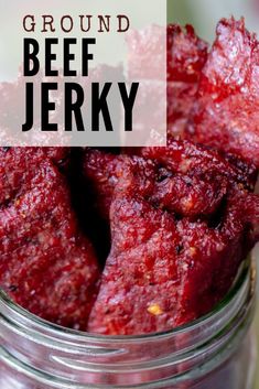 a jar filled with beet jervy sitting on top of a table