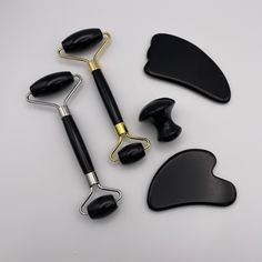 Our Black Obsidian stone facial roller and Gua Sha combo set is available in your choice of gold or silver trim and heart or feather Gua Sha. These facial tools have a refreshing soothing and smoothing effect on skin. They are super simple to use and have an immediate impact on the fluid within the tissues of the face, including blood and lymphatic systems. Face Roller and Gua Sha Benefits: Improved Circulation*: Prompt oxygen rich blood to come to the surface of the skin releasing toxins and re Gua Sha Benefits, Face Roller And Gua Sha, Black Skincare, Face Rollers, Roller And Gua Sha, Facial Tools, Face Tools, Black Obsidian Stone, Gua Sha Facial