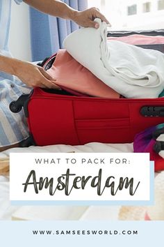 an open suitcase with clothes in it and the words what to pack for amsterdam on top