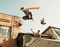 a man flying through the air while riding a skateboard next to another man on a ramp