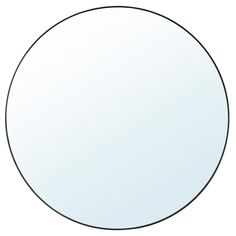 a round mirror on a white background