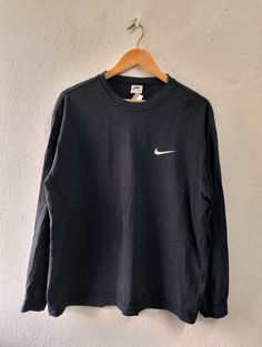 ⚡Size Large  ⚡Pit to pit 24 inches ⚡Shoulder to bottom hem 29 inches ⚡Condition 8/10 Good condition Nike Cotton Long Sleeve Shirt, Nike Relaxed Fit Moisture-wicking T-shirt, Nike Black Cotton T-shirt, Nike Long Sleeve Sports T-shirt, Nike Collegiate Long Sleeve T-shirt, Nike Long Sleeve, Nike Vintage, Mens T Shirts, Vintage Nike