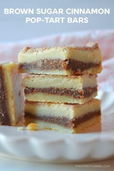 brown sugar cinnamon pop - tart bars stacked on top of each other in a white plate