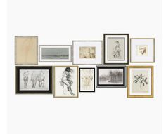 an assortment of framed and unframeed art work