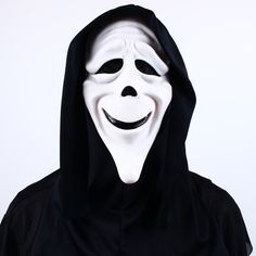 a person wearing a white mask with a black hood