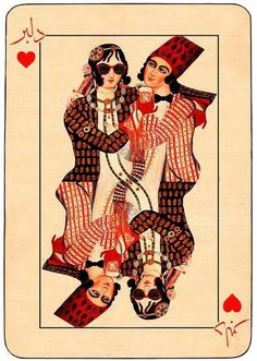 two women dressed in red and black are playing cards with hearts on the back ground