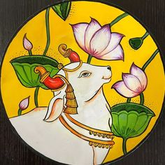 a painting of a goat with flowers on it's back