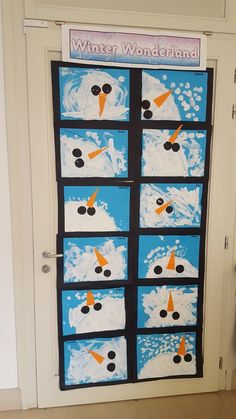 a door decorated to look like a snowman with many different images on it and the words winter wonderland written in black