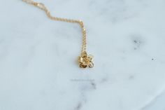 Dainty Rounded Petal Lily Flower charm necklace! Tiny stamens make it look realistic, I also think it can pass for a plumeria. Brass Casting Gold Dipped/Plated Chain & Pendant Charm: 0.45" length: 16" with 2" foxtail chain extender -18k gold plated -Lobster Clasp * care - not recommended for children - Treat delicately, most items in my shop are made with tiny chains and delicate - Store your jewelry in a enclosed space (same package, ziplock bag, plastic case, etc) - A plus if you have anti-tar Delicate Gold Flower Necklace With Flower Charm, Delicate Yellow Gold Flower Pendant Necklace, Nature-inspired Gold Necklace With Flower Charm, Nature-inspired Gold Necklace With Flower Pendant, Gold Flower Pendant Charm Necklace, Fine Jewelry, Flower Charm Necklace, Flower Pendant Necklace, Chain Extenders, Gold Dipped