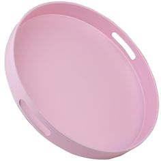 a round pink tray with handles on an isolated white background