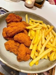 fried chicken and french fries on a plate