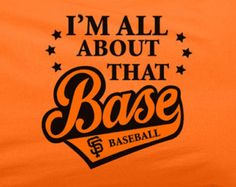 i'm all about that base baseball t - shirt in orange with black lettering