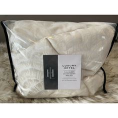 the luxury bedding set is in white and black