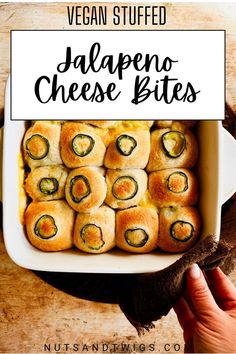 Top view of a hand holding the baking dish of bites. Top view. Stuffed Jalapeños, Stuffed Jalapeno, Cheesy Snack, Easy To Make Snacks, Vegan Biscuits, Jalapeno Cheese, Cheese Bites