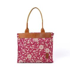 "MARSALA KALAMKARI LARGE TOTE BAG Fabric & leather tote bag: The chic maroon/marsala colour kalamkari print tote bag combined with real tan leather The bag has a zipped pocket, a mobile phone pocket and a small accessories pocket in the inside. Also has a buttoned pocket on the outside The bag has metallic zip closure and cotton canvas handle. Easy to carry and manage. Material : cotton printed lining inside. Size: Height 12\"; width 14\", gusset 4\", handle height 13\" * In stock, ready to ship Rectangular Canvas Bag With Leather Handles For Errands, Cotton Summer Bags For Errands, Summer Cotton Bag For Errands, Cotton Satchel With Canvas Lining Tote Shape, Cotton Shoulder Bag For Summer Errands, Cotton Shoulder Bag With Adjustable Strap For Errands, Coated Canvas Tote Shoulder Bag For Daily Use, Square Canvas Satchel With Leather Handles, Rectangular Canvas Shoulder Bag With Leather Handles