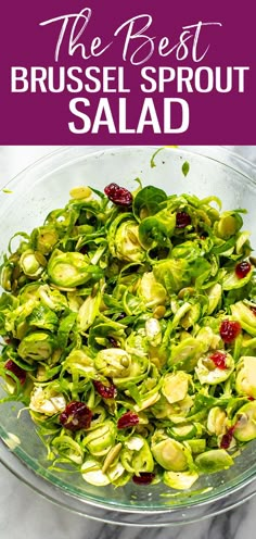 brussel sprout salad in a glass bowl with cranberry sauce