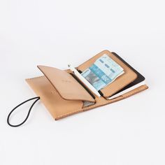 Travel Wallet Natural — Essential Articles Travel Documents, Passport Case, Travel Wallet, Travel Wallets, Vegetable Tanned Leather, Elastic Band, Hand Sewing, Divider, Initials