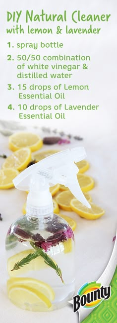 a bottle of lemon and lavender essential oil next to sliced lemons