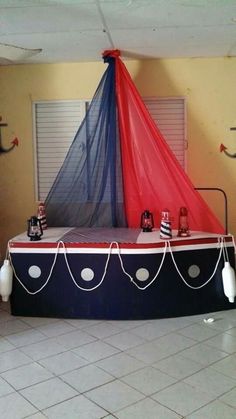 a boat shaped bed in the middle of a room