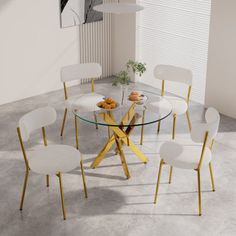 a glass table with four white chairs around it and a plant in the corner next to it