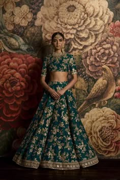 sabyasachi Green Sets With Gold Embroidery In Traditional Drape, Festive Green Sets With Gold Embroidery, Green Dupatta With Gold Embroidery For Wedding, Green Traditional Wear With Gold Embroidery, Traditional Green Wear With Gold Embroidery, Green Anarkali Set With Gold Embroidery, Designer Gold Choli With Meenakari, Designer Green Brocade Traditional Wear, Green Anarkali With Gold Embroidery