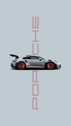 a grey sports car with the word porsche on it