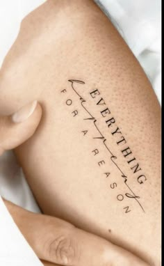 a woman's leg with writing on it