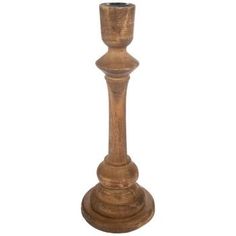 a tall wooden candle holder on a white background