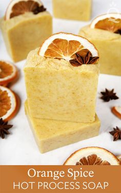 orange spice hot process soap with an orange slice cut in half