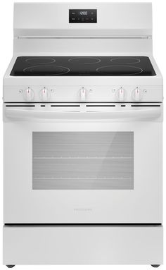 a white stove top oven with the door open