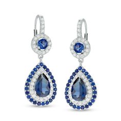 Give her a reason to dress up with these dazzling fashion drop earrings. Crafted in sterling silver, each earring features a dangle centered with a 9.0 x 6.0mm pear-shaped lab-created bright blue sapphire. Frames of lab-created white and blue sapphires wrap the center stone in a sparkling embrace. Above, a round blue sapphire is framed with a halo of white sapphires, while additional white sapphires line the fronts of the lever back closures. Buffed to a brilliant luster, these earrings are the Luxury Sterling Silver Pear-shaped Earrings, Luxury Pear-shaped Sterling Silver Earrings, Luxury Blue Pear-shaped Earrings, Elegant Pear-shaped Blue Jewelry, Elegant Teardrop Chandelier Earrings In Sterling Silver, Elegant Blue Pear-shaped Jewelry, Teardrop Earrings With Elegant Design, Luxury Blue Drop Earrings, Elegant Teardrop Sterling Silver Diamond Earrings