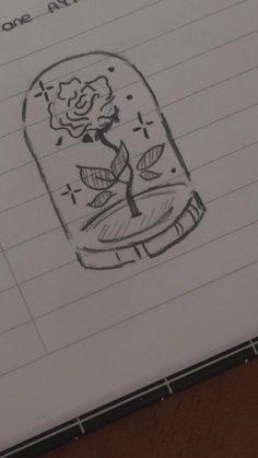 a drawing of a rose in a jar with writing on it