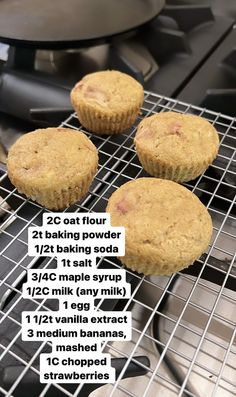 three muffins sitting on top of a cooling rack