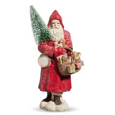 a statue of santa holding a christmas tree and basket with presents on his lap, standing in front of a white background