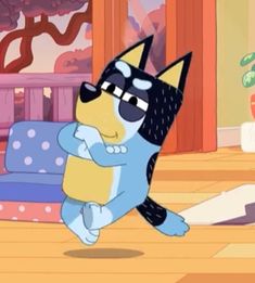 a cartoon cat with glasses is dancing on the floor