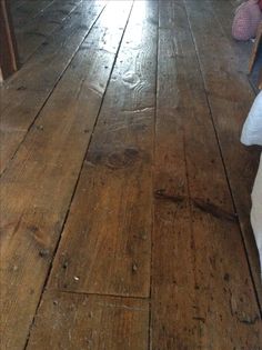 an old wooden floor is shown in this image