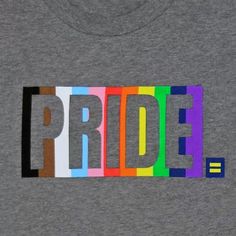 the word pride written in multicolored letters on a t - shirt that says pride