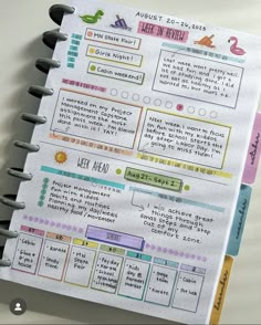 an open planner with some notes on it