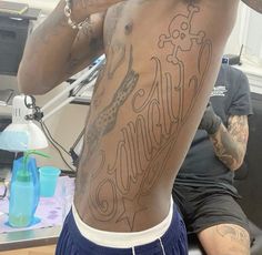 Swag Tattoo Ideas, Collar Bone Tattoo Writing, Steve Lacy Tattoo Ideas, Waistline Tattoos For Men, Chrome Hearts Tattoo, Back Tattoos For Men, Cover Up Tattoos For Men, Guerriero Samurai, Line Tattoo Ideas