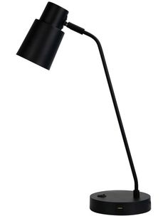 a black desk lamp on a white background with the light turned on and one arm extended