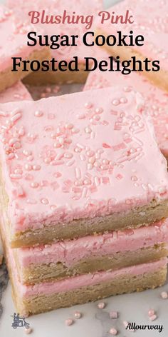 pink sugar cookie frosted delights are stacked on top of each other