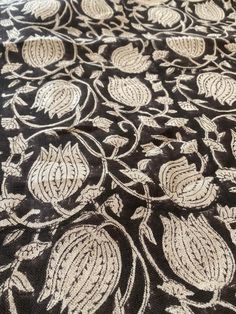 black and white fabric with flowers on it