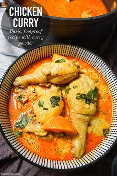 chicken curry in a bowl with red sauce and garnished with parsley on the side