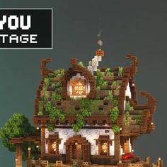 an image of a house made out of legos with trees and bushes on the roof