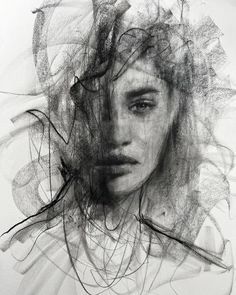 a drawing of a woman's face with many lines coming out of her hair