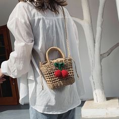 Go on a picnic or cherry picking in this mini straw bag with a chunky crochet cherry. 19cm x 14cm x 8cm 7.48" x 5.51" x 3.15" Chic Spring Straw Bag For Picnic, Chic Straw Bag For Spring Picnic, Casual Spring Straw Crochet Bag, Casual Straw Crochet Bag For Spring, Casual Crochet Bag For Summer, Trendy Natural Colored Bag For Picnic, Trendy Natural Color Bag For Picnic, Trendy Natural Color Picnic Bag, Trendy Spring Picnic Bags