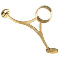 a pair of gold scissors sitting on top of each other