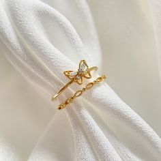 This exquisite piece features a graceful butterfly motif delicately crafted on a double band gold ring, adorned with vibrant gemstones that captivate the eye. It's not just a ring, it's a symphony of elegance and versatility. Save time and elevate your style effortlessly with this unique design - it's like having two rings in one and adjustable to fit your fingers! Whether you're dressing up for a special occasion or adding a touch of whimsy to your everyday look, this ring is your perfect compa Double Band Ring, Butterfly Motif, Double Band Rings, Gift Sets For Her, Valentines Day Birthday, Gold Band Ring, Colored Gems, Nature Inspired Design, Ring Dainty